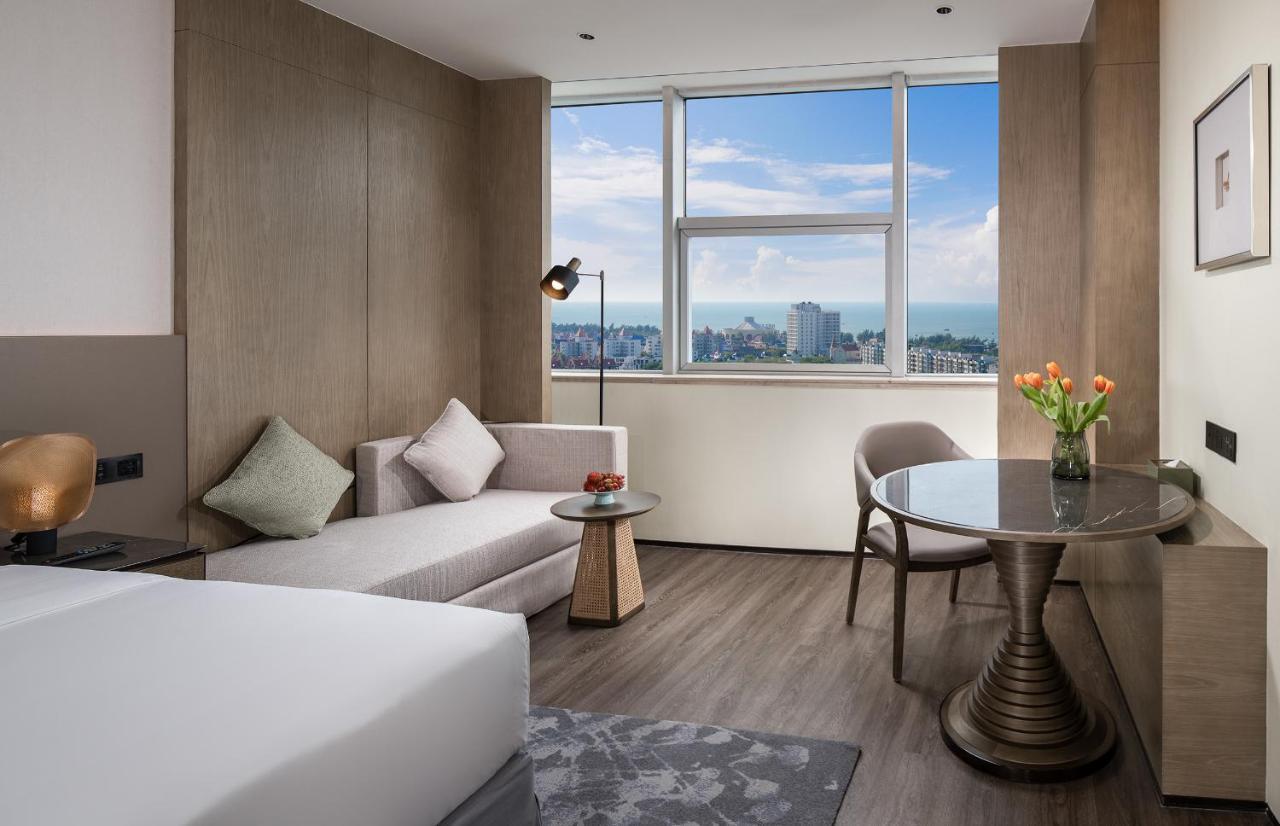 Golden Shining New Century Grand Hotel Beihai Exterior photo